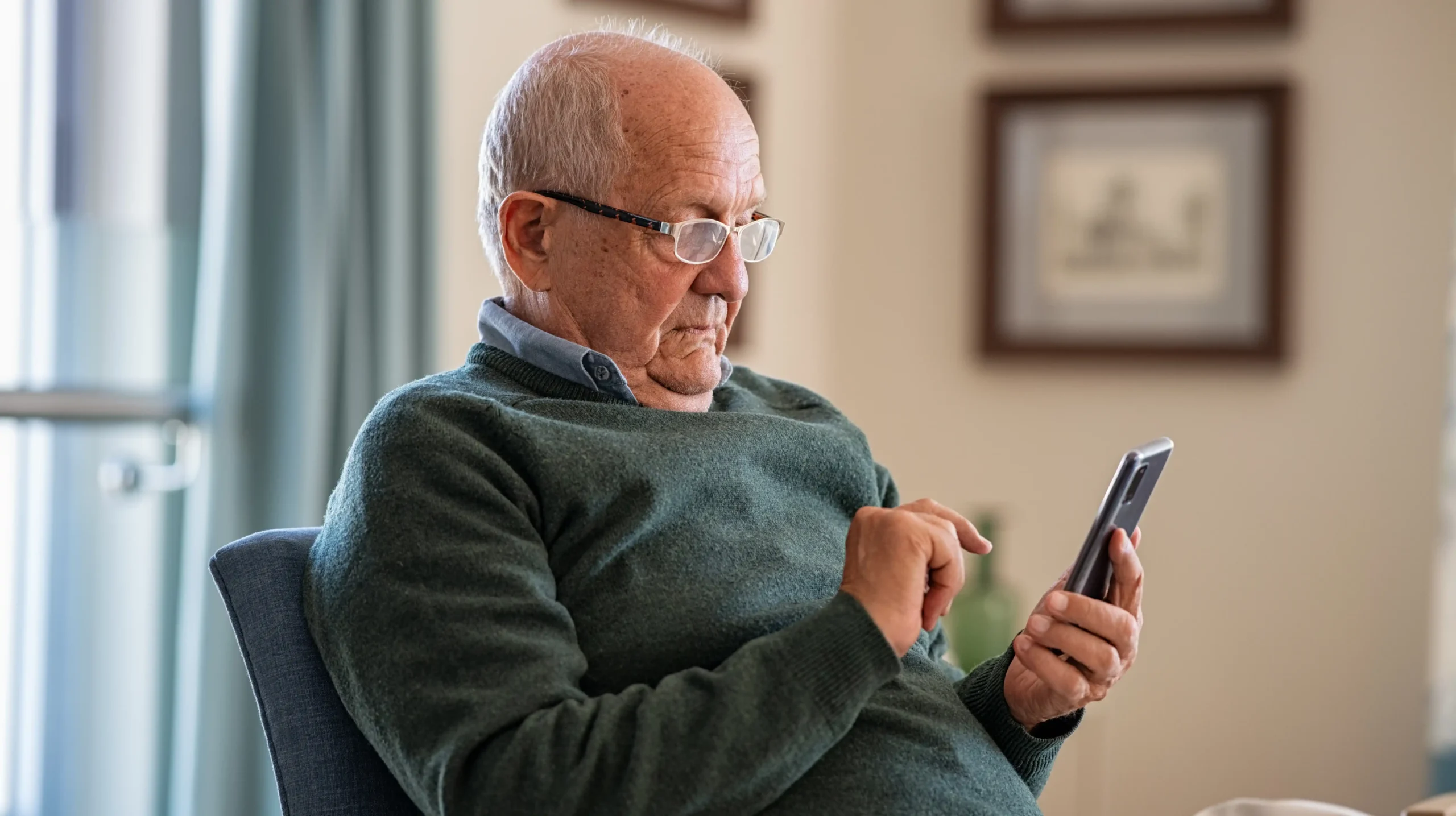 Senior using smart phone
