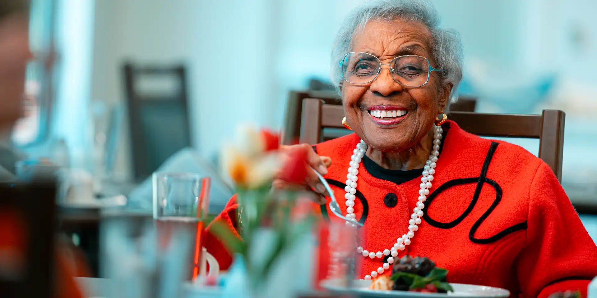 Canterbury resident enjoying a meal with friends