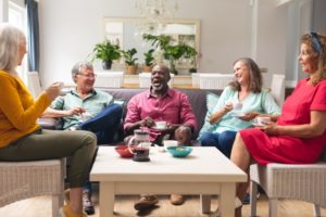 Seniors socializing together in an apartment