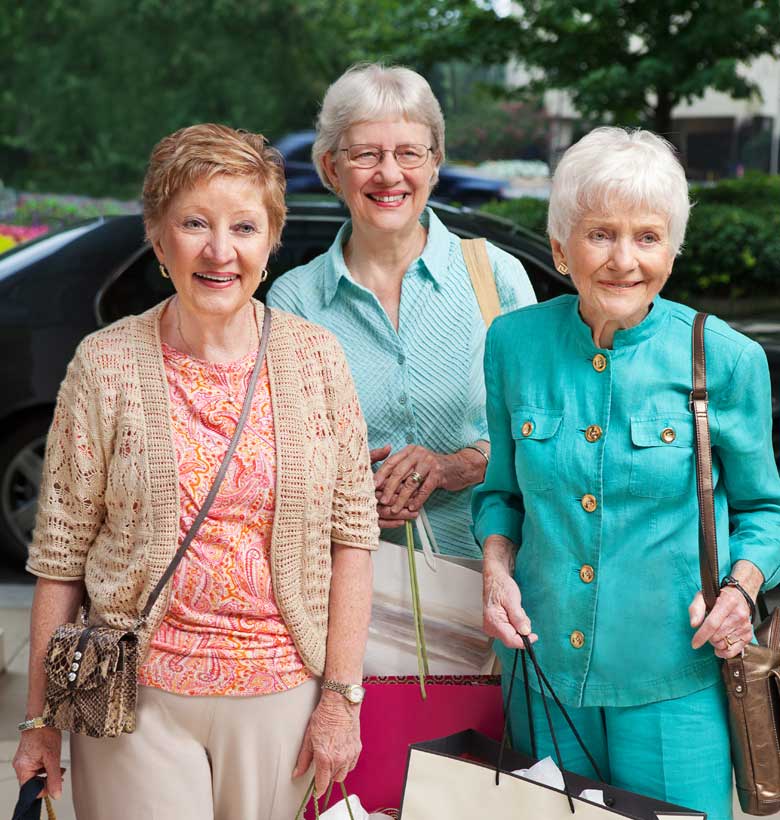 Senior living residents returning from shopping day trip